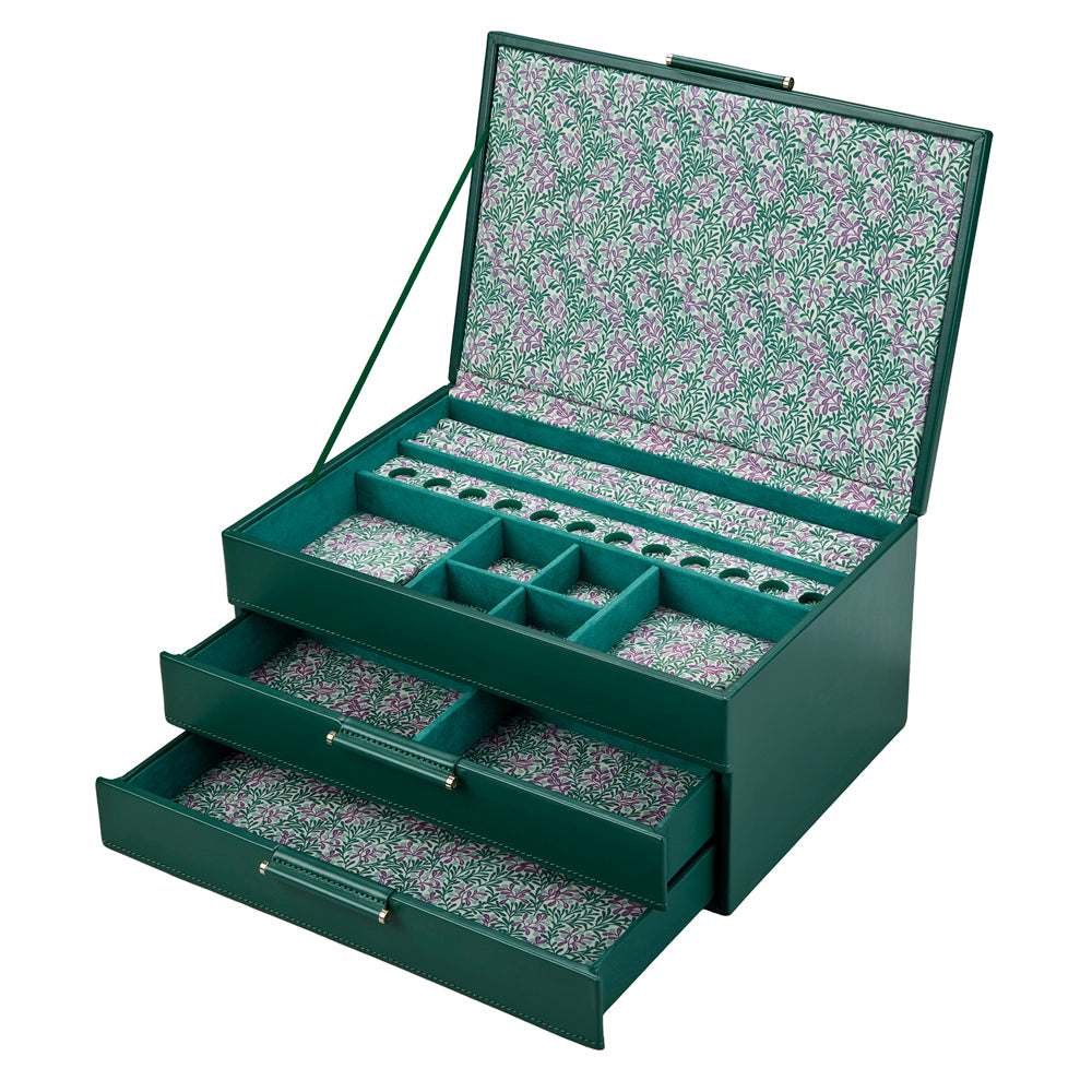 Boîte à bijoux verte ouverte et intérieur fleuri