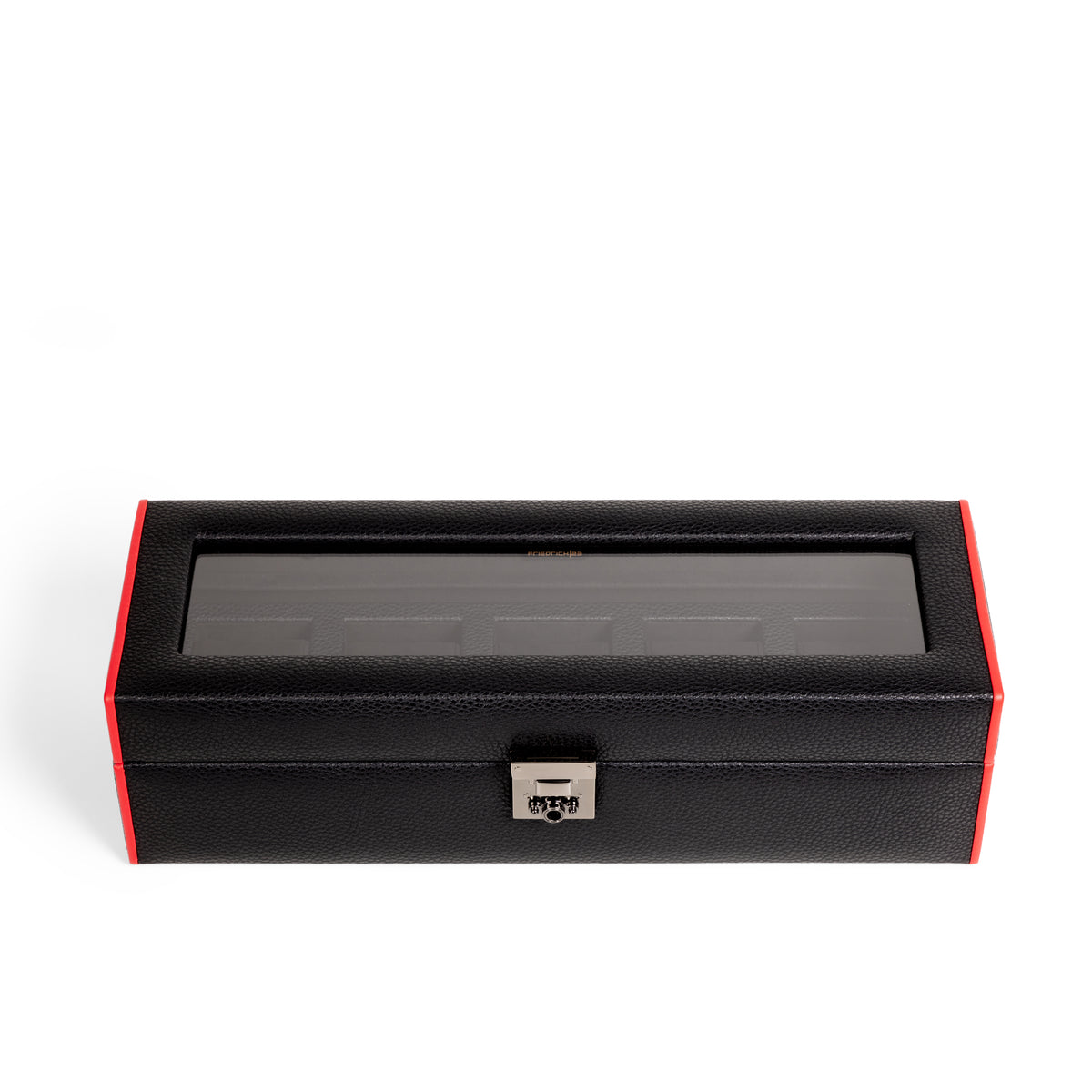 Boîte à montre vitrée en cuir noir avec passepoil rouge Maranello, cinq emplacements. Vue fermée de haut sur fond blanc