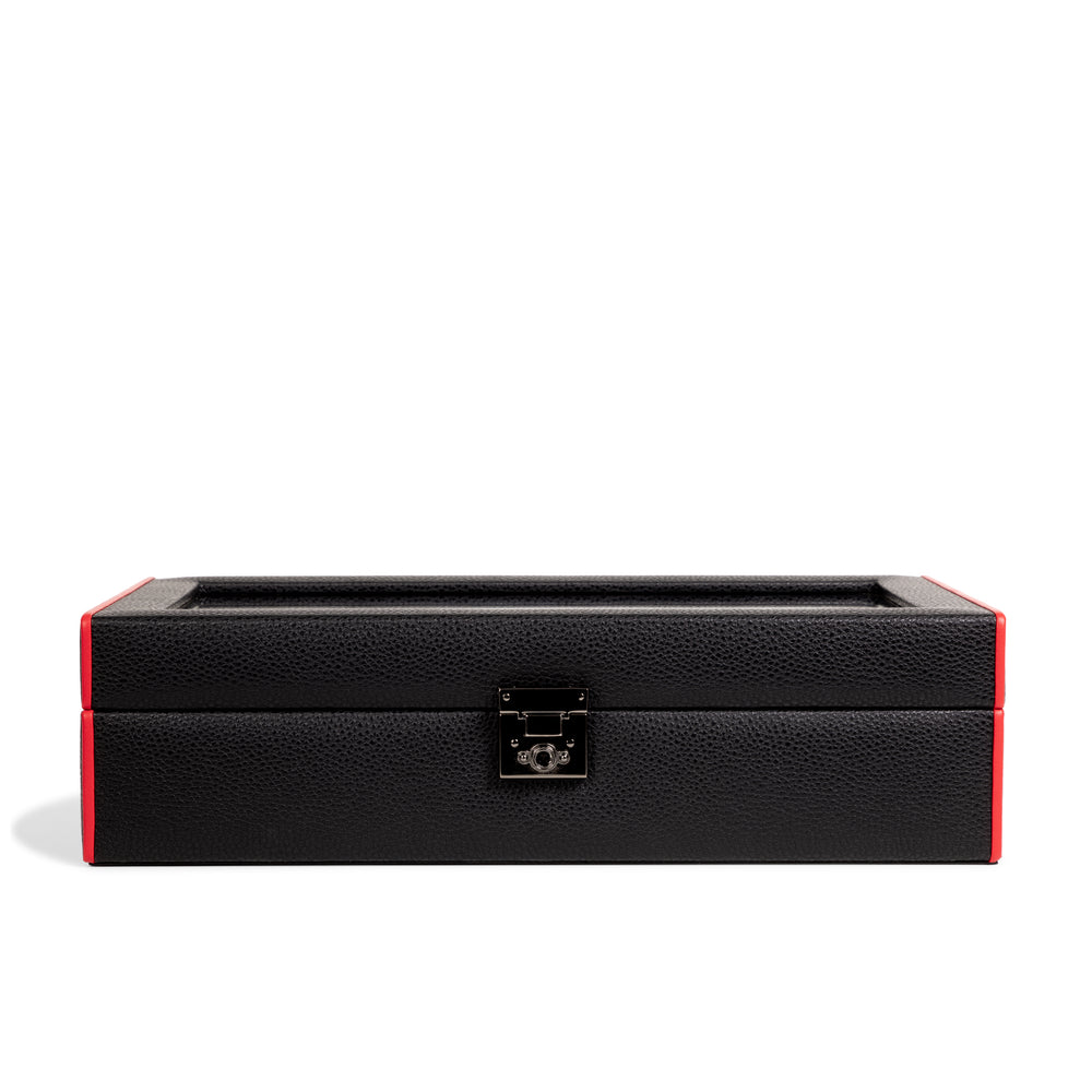 Boîte à montre vitrée en cuir noir avec passepoil rouge Maranello, dix emplacements. Vue fermée de face sur fond blanc