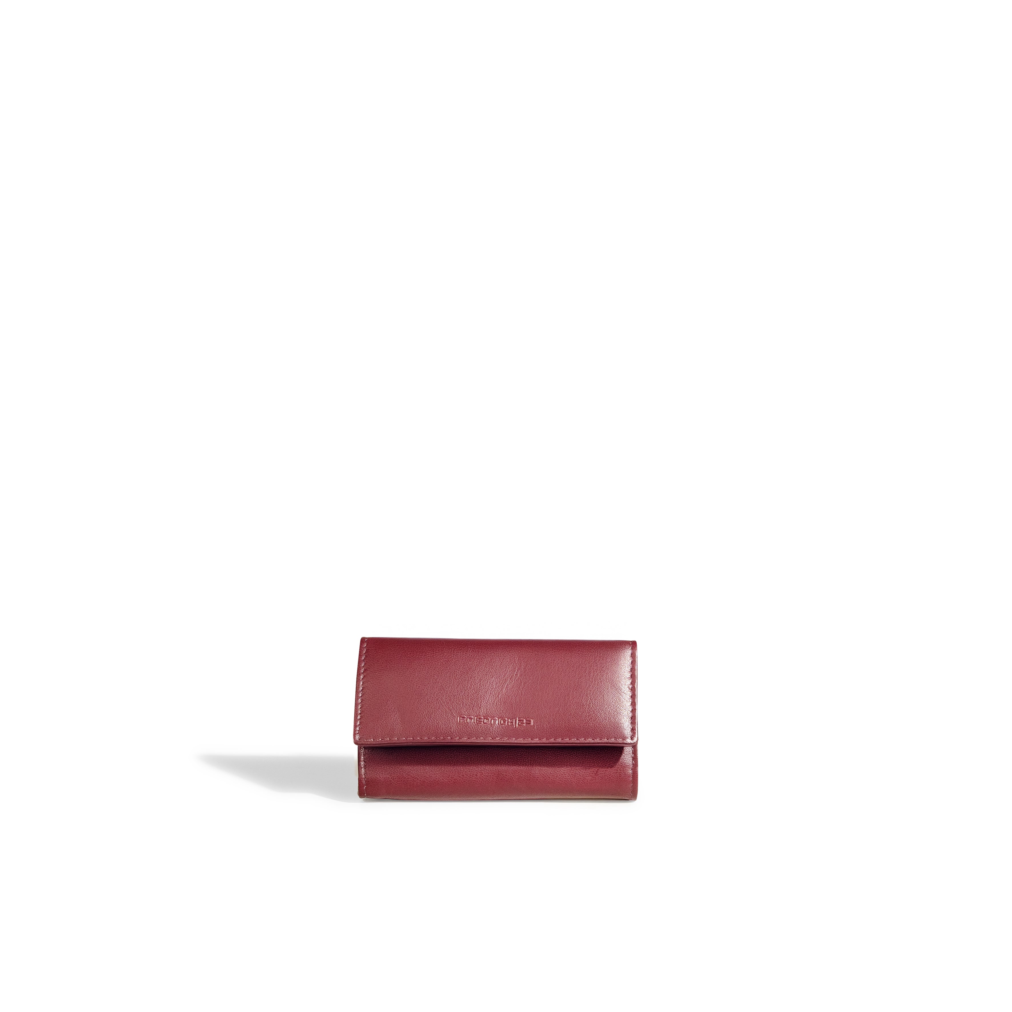Pochette en cuir véritable Sienna, cuir véritable, bordeaux, vue fermée, de face posé sur la tranche