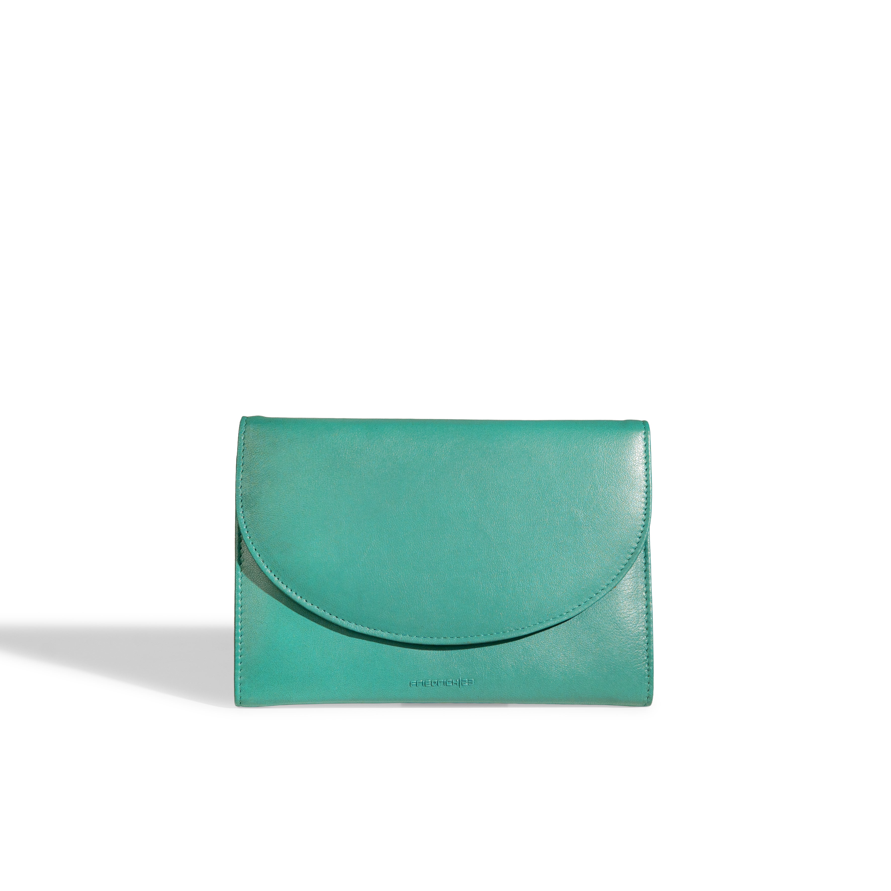 Grand étui à bijoux de voyage en cuir véritable Sienna, vert turquoise, vue fermé, de face, posé sur la tranche